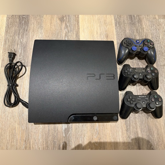 Sony PS3 Console with Two Controllers - Picture 1 of 7